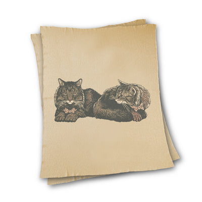 Cream knitted blanket with a cat in a bow tie